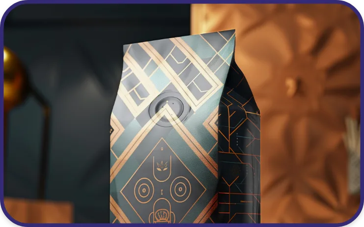 Detailed close-up of a coffee bag with geometric printed design, highlighting the one-way degassing valve that keeps coffee fresh.