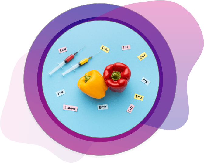 Colored bell peppers with syringes and food additive labels such as E230 and E510 representing food safety testing and FDA oversight under the Food Safety Modernization Act (FSMA).