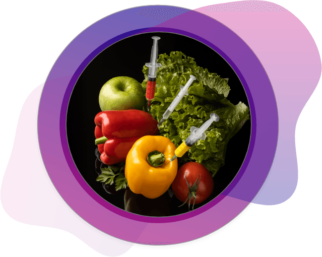 Fresh produce including peppers, apples, and lettuce injected with syringes symbolizing testing for contaminants and chemical safety under FSMA food protection standards.