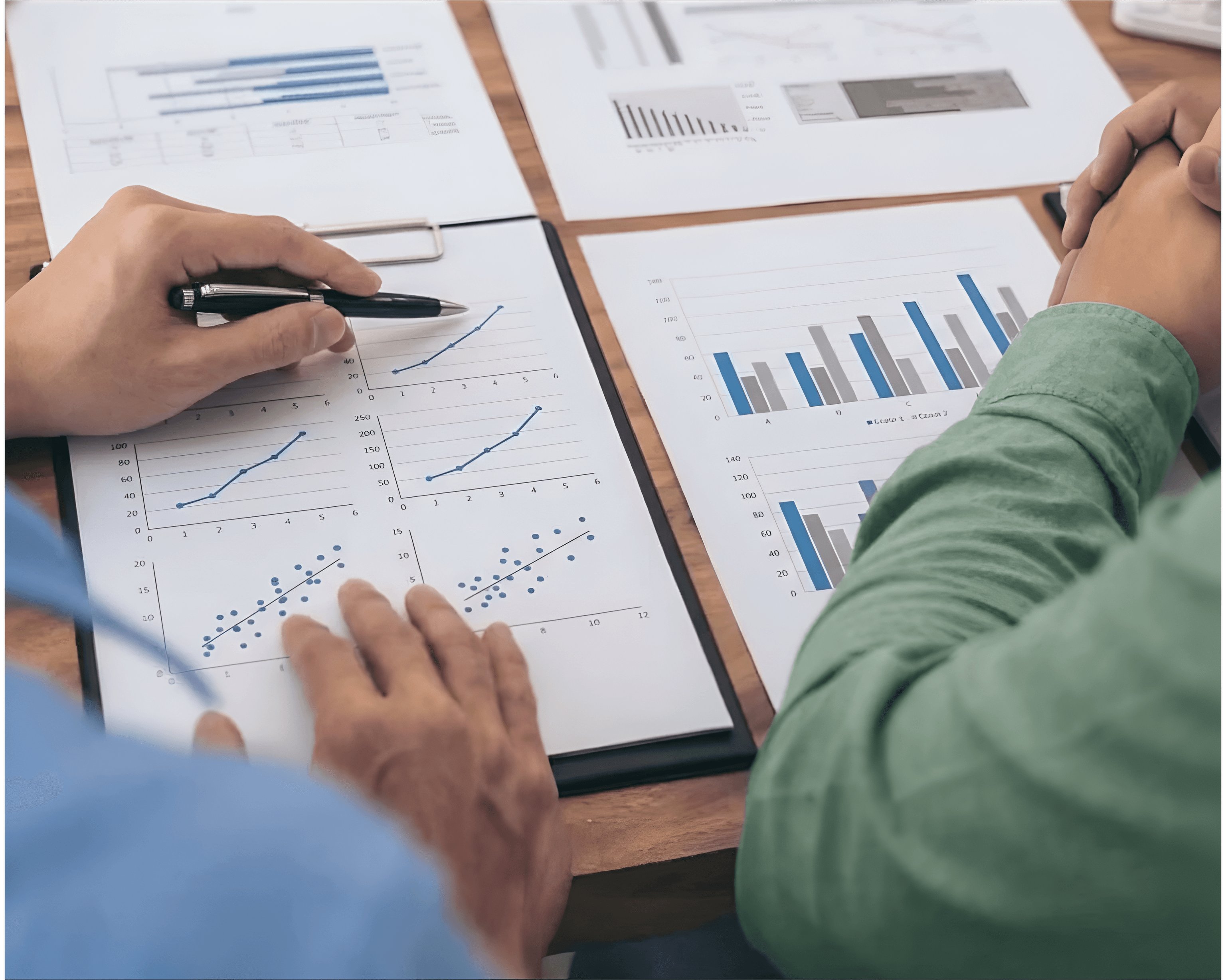 Team analyzing barrier properties and laminate options to choose the right flexible packaging material for custom plastic pouches, focusing on moisture resistance and food-grade compliance.