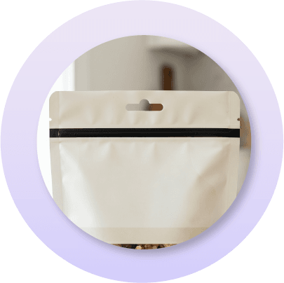 Flexible pouch with integrated hang hole feature designed for retail merchandising, pegboard displays, and improved product visibility in stores.